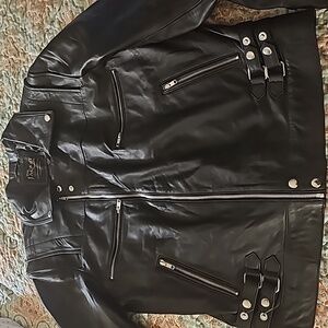 Black leather motorcycle jacket made by the jacket seller. New without tags.
